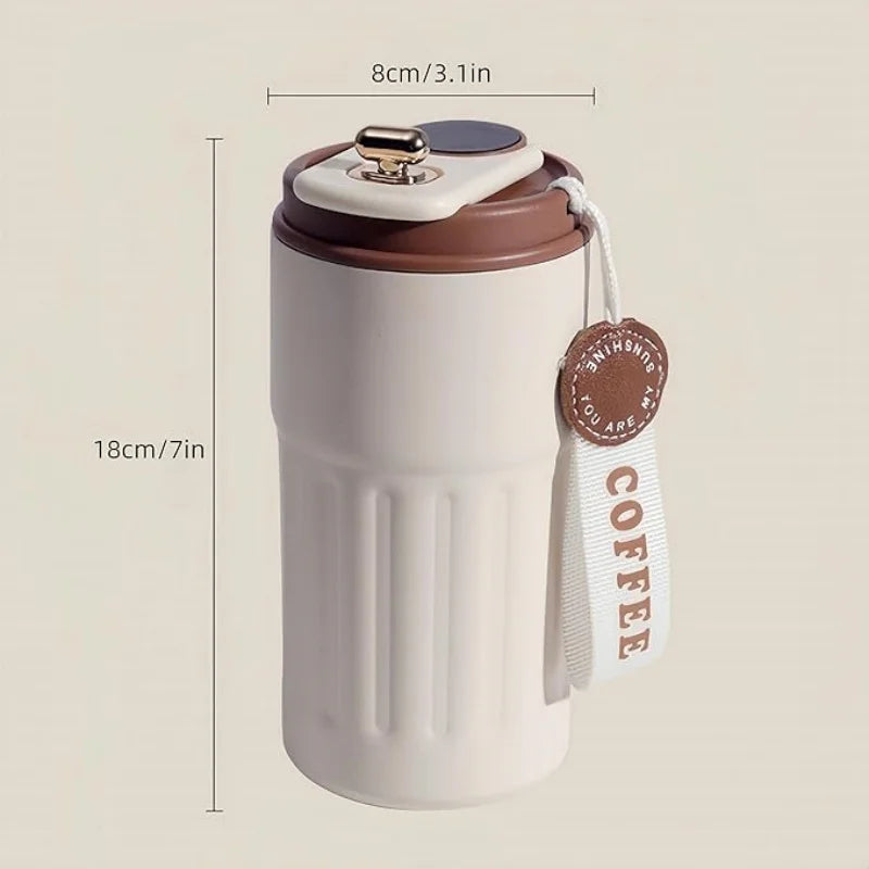 Coffee cup, vacuum insulated drum with temperature displa