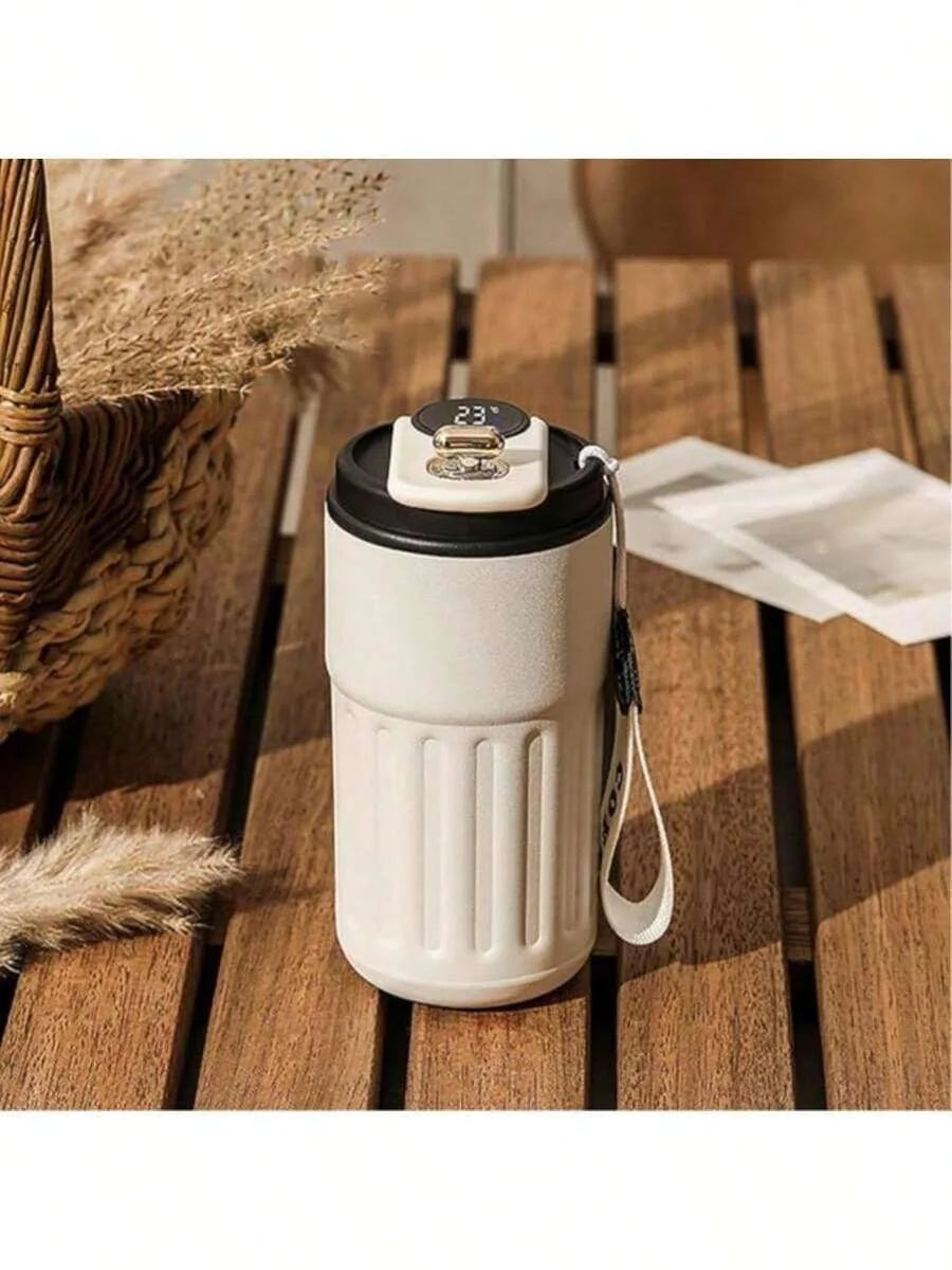 Coffee cup, vacuum insulated drum with temperature displa