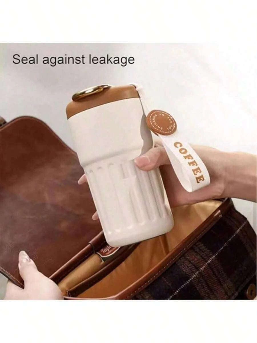 Coffee cup, vacuum insulated drum with temperature displa