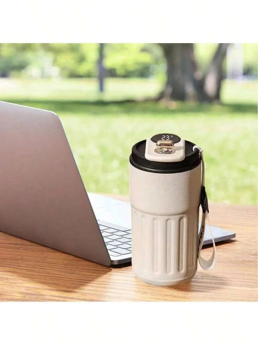 Coffee cup, vacuum insulated drum with temperature displa